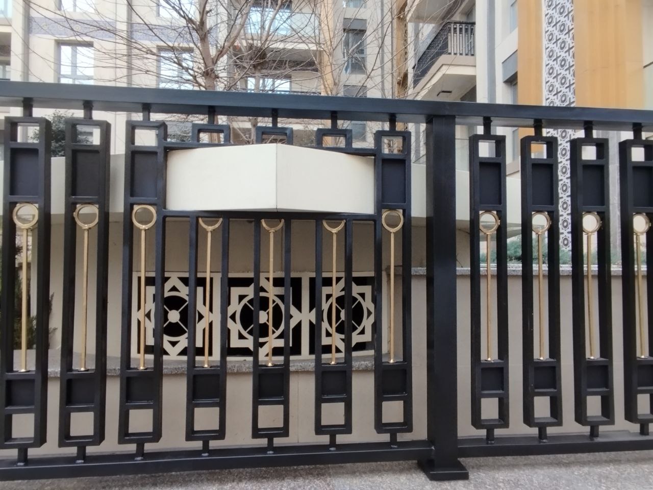 Decorative metal railing with gold-coloured elements