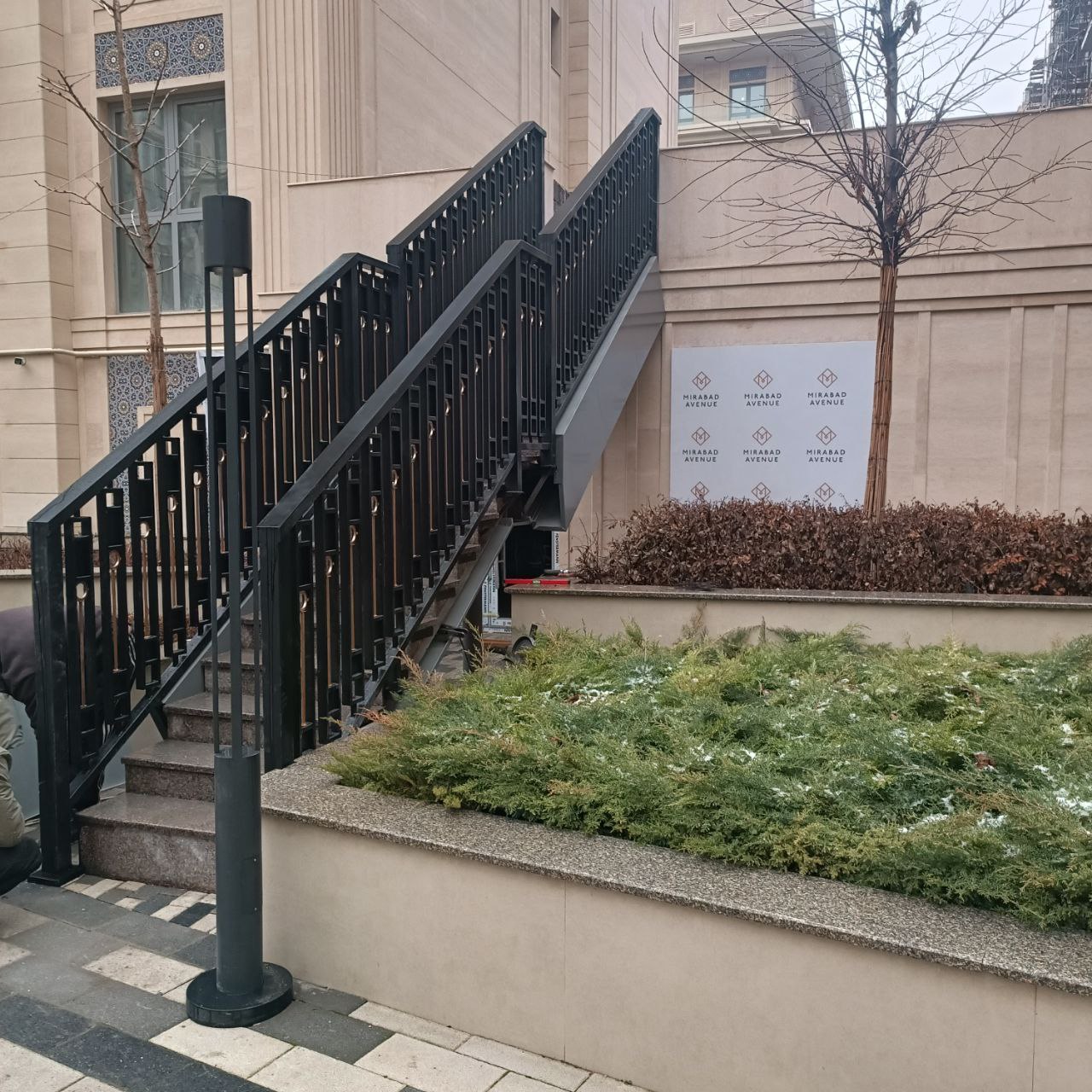 Metal railing and lighting pole installed at Mirobod Avenue